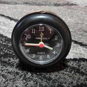 TRAVEL PORTABLE QUARTZ BLACK LIFELONG FOLD-UP ALARM CLOCK